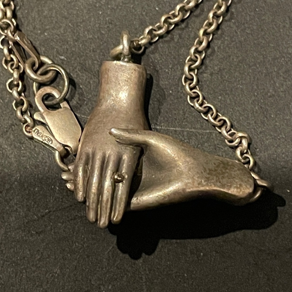 Holding Hands pendant necklace
